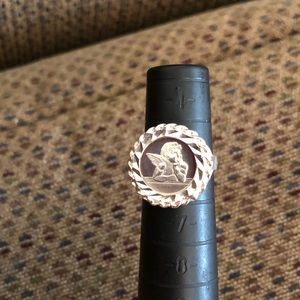 Vintage silver size 6 guardian angel coin ring.